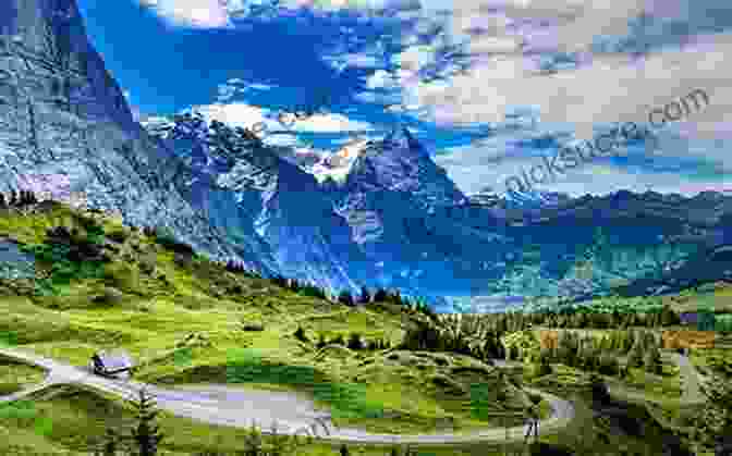 A Breathtaking Panoramic View Of The Swiss Alps, With Rolling Green Hills, Snow Capped Peaks, And A Clear Blue Sky. 100 Hut Walks In The Alps: Routes For Day Walks And Overnight Stays In France Switzerland Italy Austria And Slovenia (Cicerone Guides)