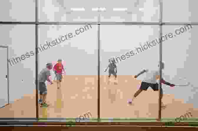 An Indoor Racquetball Court With Two Players Engaged In A Match Racquetball In 5 Words: Sports