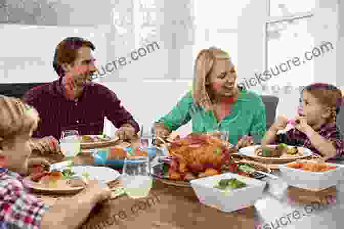 Image Of A Family Sitting Around A Dinner Table, Sharing A Roasted Chicken, Roasted Vegetables, And A Salad. The Pollan Family Table: The Very Best Recipes And Kitchen Wisdom For Delicious Family Meals